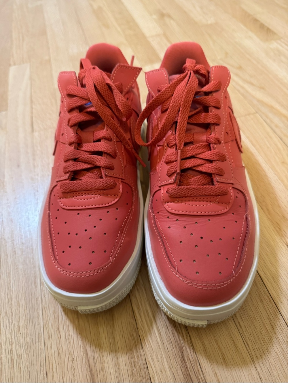 Nike women’s hot pink Low-Top Athletic Sneakers